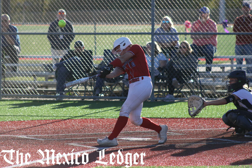 Mexico junior Hannah Loyd lifts a pitch on Thursday in the Class 4 District 5 tournament in Hannibal.