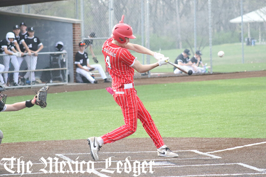 Mexico senior Jaydon Eldridge smacks a bases-clearing triple against Centralia on Thursday in Mexico as part of his seven-RBI game.
