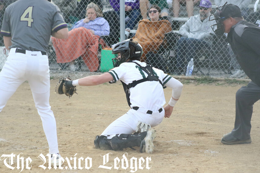 North Callaway senior Carter Moore catches a pitch against Hallsville in an earlier home game this season.