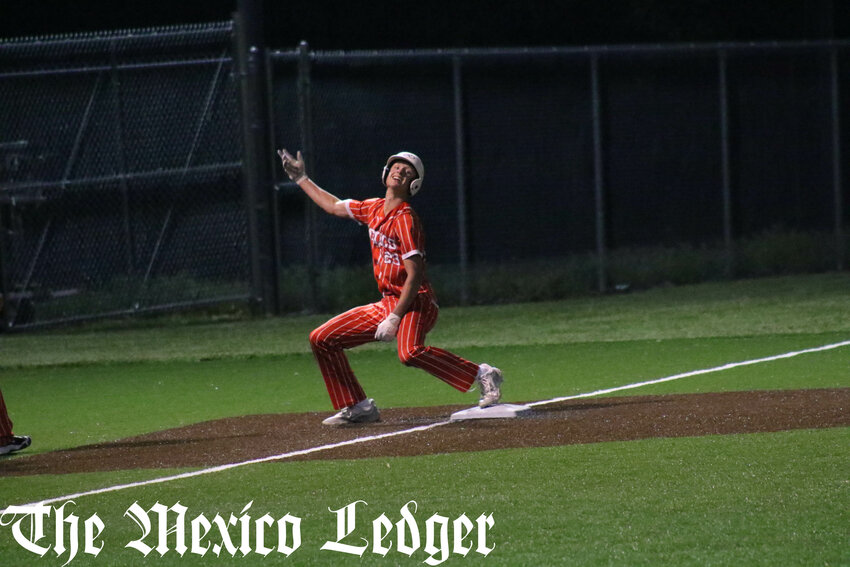 Mexico junior Kaden Benne signals to his dugout after driving in two runs on Friday night against Moberly in Mexico for the Southern Boone Classic tournament.