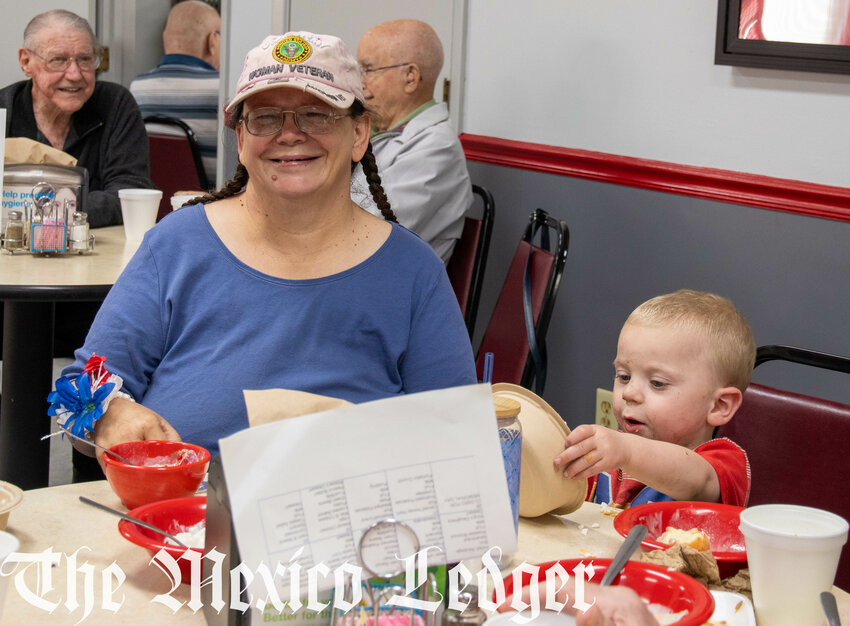 Woman veteran, mother and grandmother Sandra Dickson was joined by her family for lunch at the Mexico Activity and Nutrition Center. Next to her is one of her grandsons, Elijah Dickson.