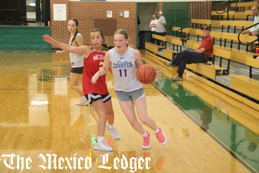 Paris senior Emma Ashenfelter dribbles around Mexico's Bentley McCarty on June 5 during the Westran Shootout in Huntsville.