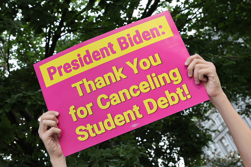 WASHINGTON, DC - AUGUST 25: Student loan borrowers stage a rally in front of The White House to celebrate President Biden cancelling student debt and to begin the fight to cancel any remaining debt on August 25, 2022 in Washington, DC. (Photo by Paul Morigi/Getty Images for We the 45m)