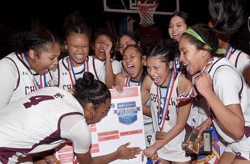 The Choctaw Central Lady Warriors celebrate winning the MHSAA Class 4A Basketball State Championship at the Mississippi Coliseum in Jackson.