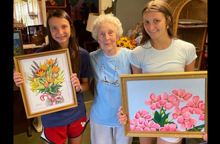 Frankie Harpole with students Sarah and Miriam Prince recently.