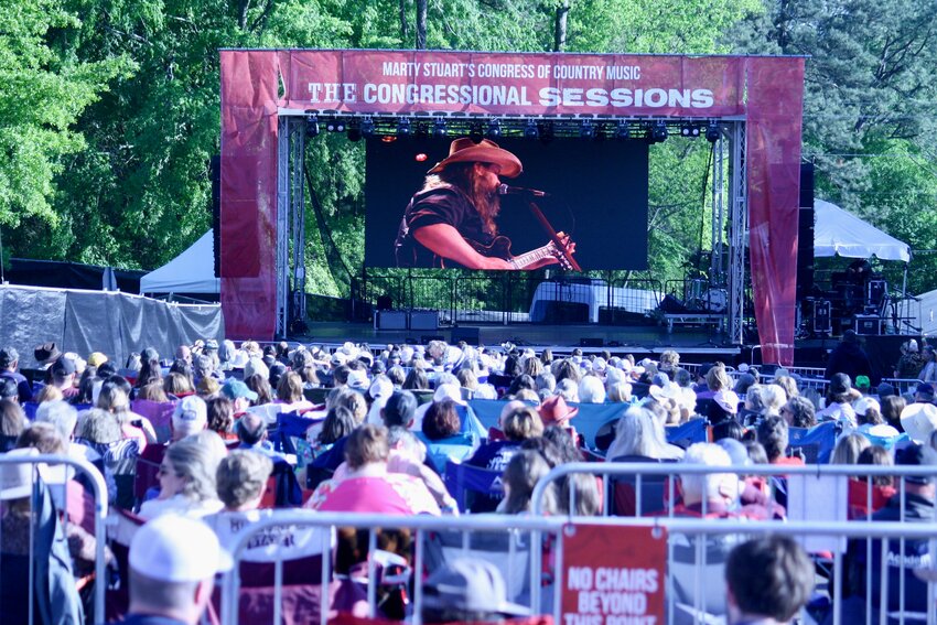 Attendees gather outside the Ellis Theater to watch Chris Stapleton perform, soaking in the music and the moment during one of the town's biggest new annual events —The Congressional Sessions, hosted by Marty Stuart's Congress of Country Music.