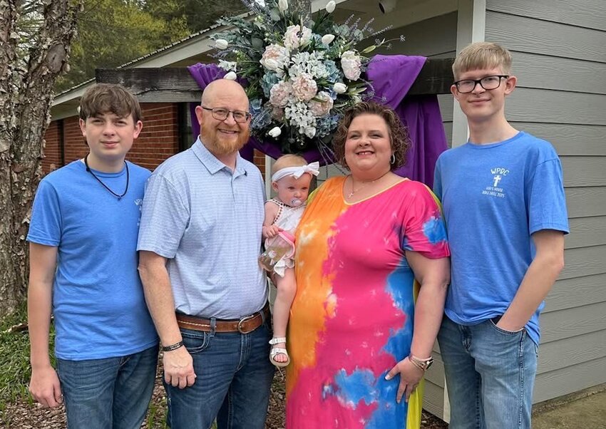Eric Sharp is the new preacher at West Philadelphia Baptist Church—God's House. Pictured, are he and his wife Amanda, and their three children, Eli, Evan, and Ella.