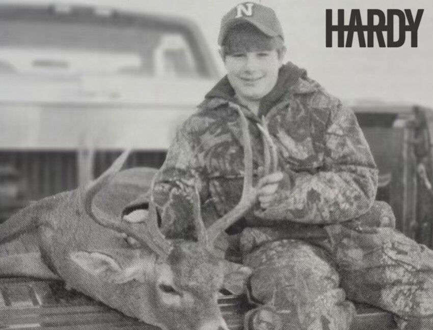 The cover art for HARDY’s new “COUNTRY!” release features a newspaper clipping from the Democrat two decades ago with him posing with a buck in the back of a pickup truck. The photo was originally published on Dec. 31, 2003.