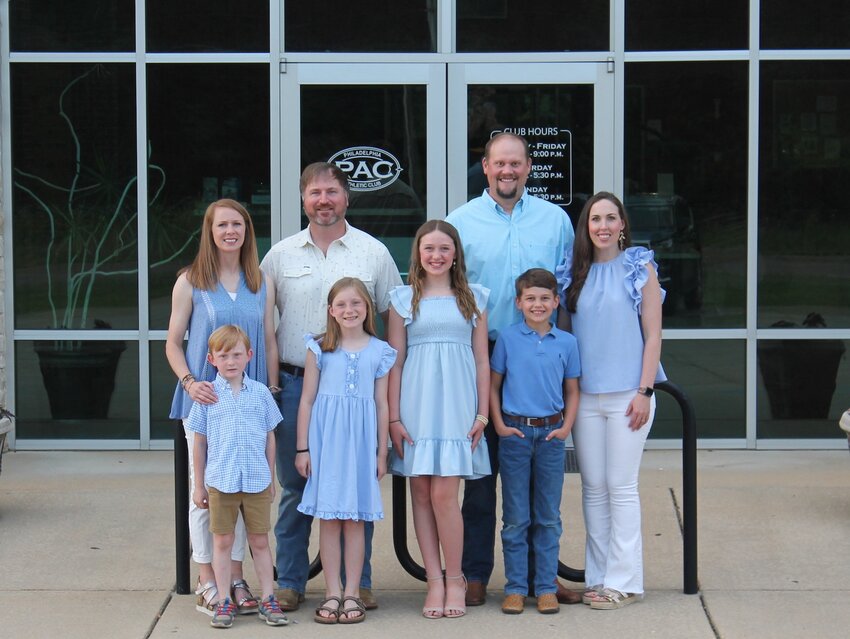 Pictured, back row from left, are Jessie Hardy, Tyler Hardy OTR/L, Grant Comans, and Kathryn Comans DPT (Front) Jack Hardy, Azlee Hardy, Emery Lee Comans, and William Comans.