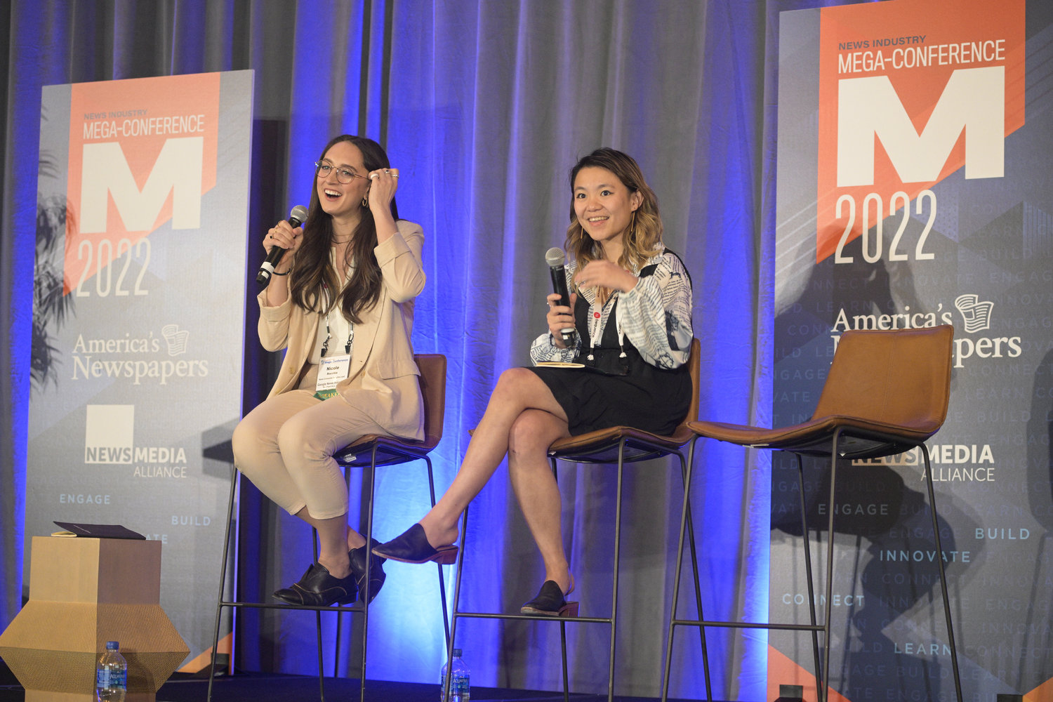 Nicole Rocchio, news consumer insights lead, and Tina Xiao, digital growth program manager -- both with the Google News Initiative -- highlighted findings from site audits from Mega-Conference attendees. (Photo by Phelan M. Ebenhack)