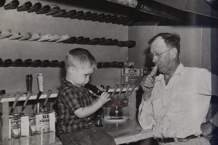 Ben Tyler at 22 months old with his grandfather who got him on the lathe for the first time at the same age.