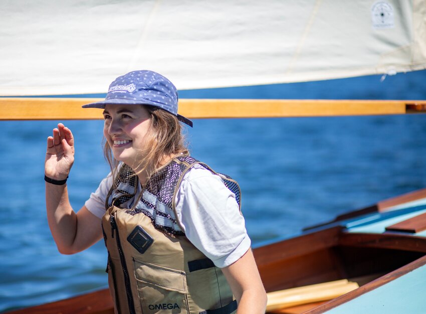 Piper Howeth gives a nervous wave to her friends ashore.