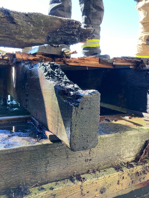 Damage caused by a fire of unknown origin on the abandoned Tyler Street wharf in Port Townsend.