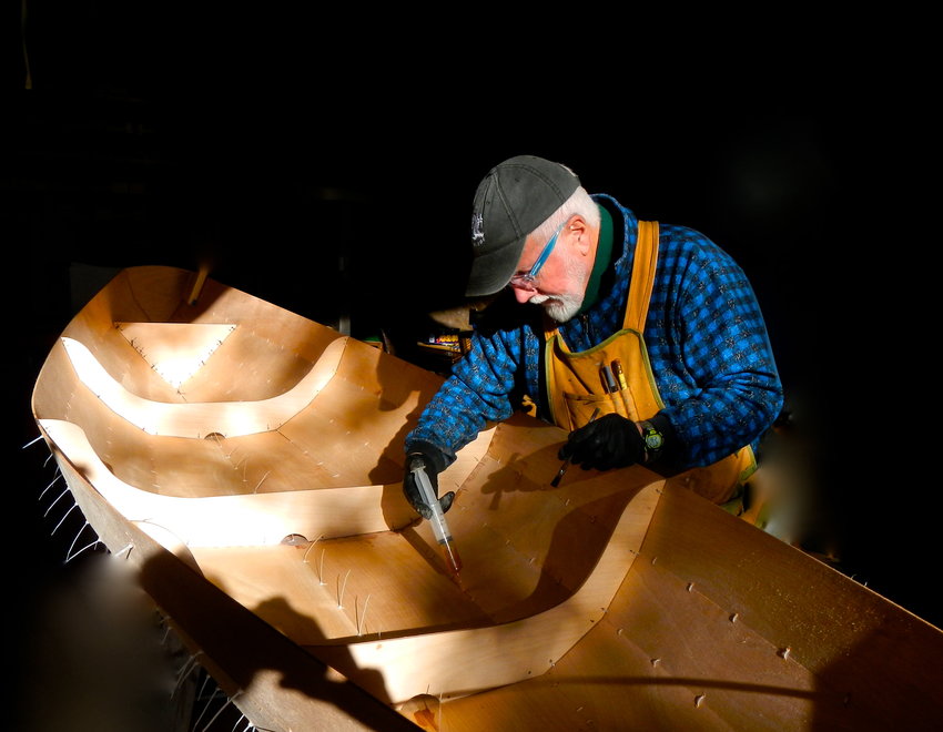 Marty Loken constructs a wooden boat using stitch and glue construction. Photo courtesy Marty Loken
