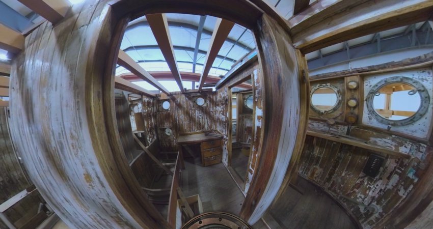 A frame of &ldquo;Inside the Western Flyer&rdquo; showing the captain&rsquo;s quarters aboard the historic vessel.