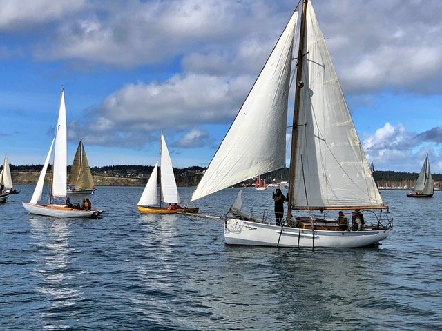 Wooden boats fill the bay during a past Shipwrights&rsquo; Regatta.