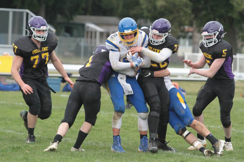 The Ranger defense swarms the Loggers&rsquo; Brenten Dalton during Saturday&rsquo;s matchup.