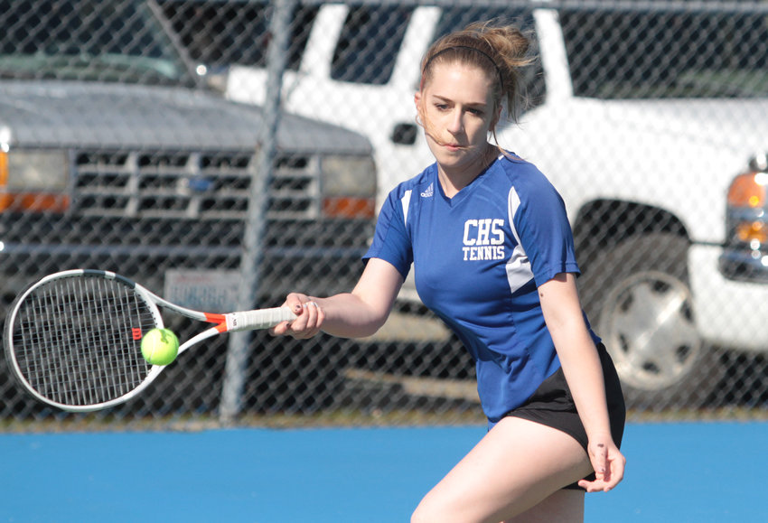 East Jefferson's Madison Hess returns the ball in girls No. 1 singles against Sierra Denning of the Buccaneers.
