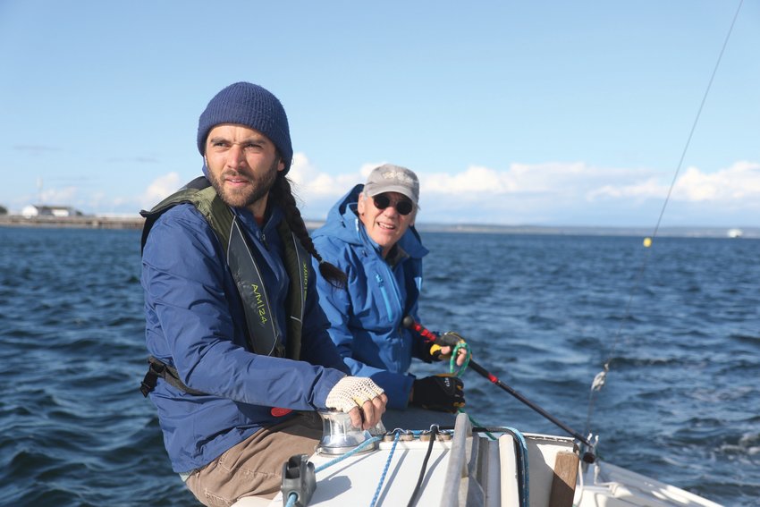 Colin Keys and Roland Nikles sail aboard the Thunderbird Falcon during the May 7 PHRF race.