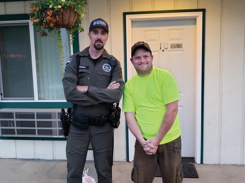 Adam Newman and Zach Hook pose for a photo during a meet-and-greet arranged by Jefferson County sheriff&rsquo;s deputies.