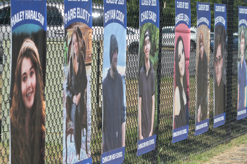 Banners featuring Chimacum's Class of 2021 hang on the fence outside the school.