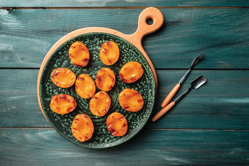 Roasted peaches are a welcome delight on any table.