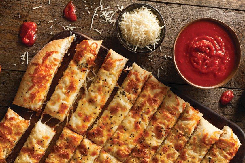 Here&rsquo;s something simple but scrumptious: cheese sticks made from frozen pizza dough.