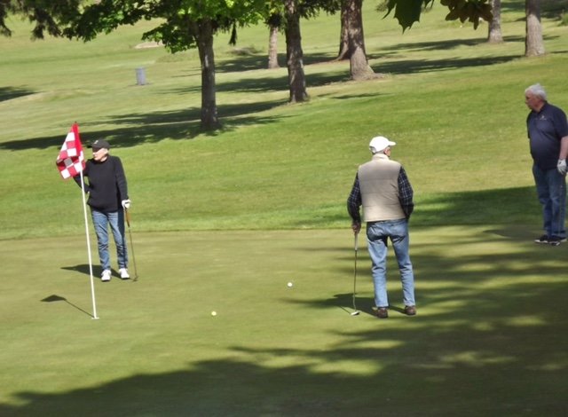 Patsy Caldwell and family play in last year's Jim Caldwell Memorial Golf Classic.