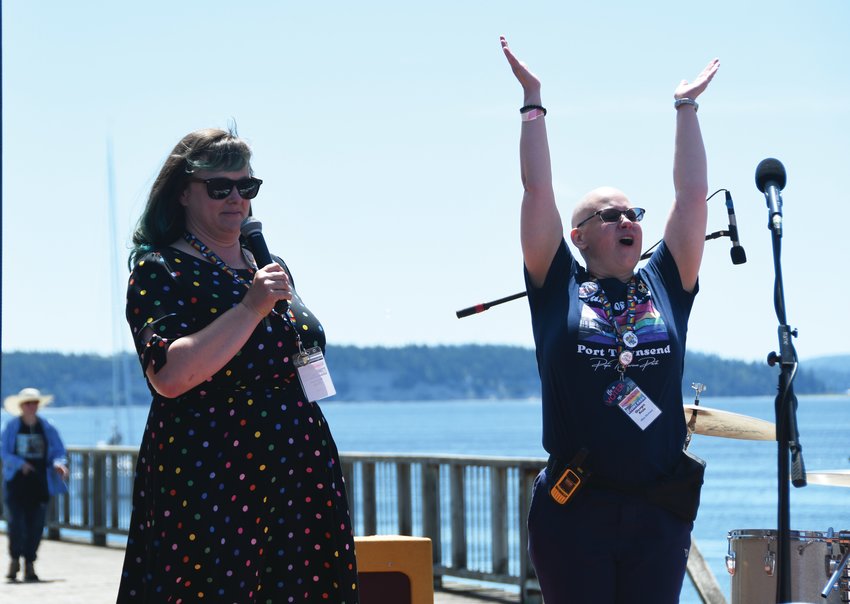 Olympic Pride organizers Kerri Kitaji (president) and Ellen Caldwell (executive director) celebrate the event Saturday afternoon at Pope Marine Park in Port Townsend.