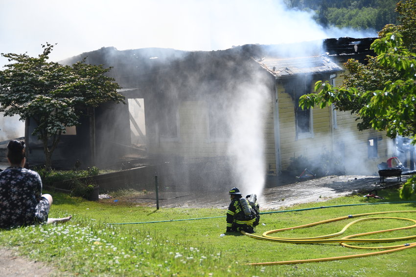 Deploying a defensive firefighting strategy to contain the flames, firefighters fought the fire from afternoon to evening at Short&rsquo;s Family Farm in Chimacum.