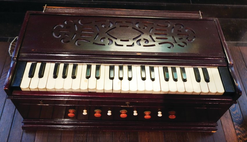 The harmonium is a pressure system free-reed organ that arrived in India in the 1800s where it immediately became popular with the ancient vocal style of music found in kirtan.