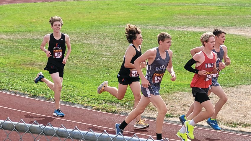 Indigo Gould (left) and Grady White (middle-left) round the corner during Saturday&rsquo;s South Whidbey Carl Westling Invite on Whidbey Island.