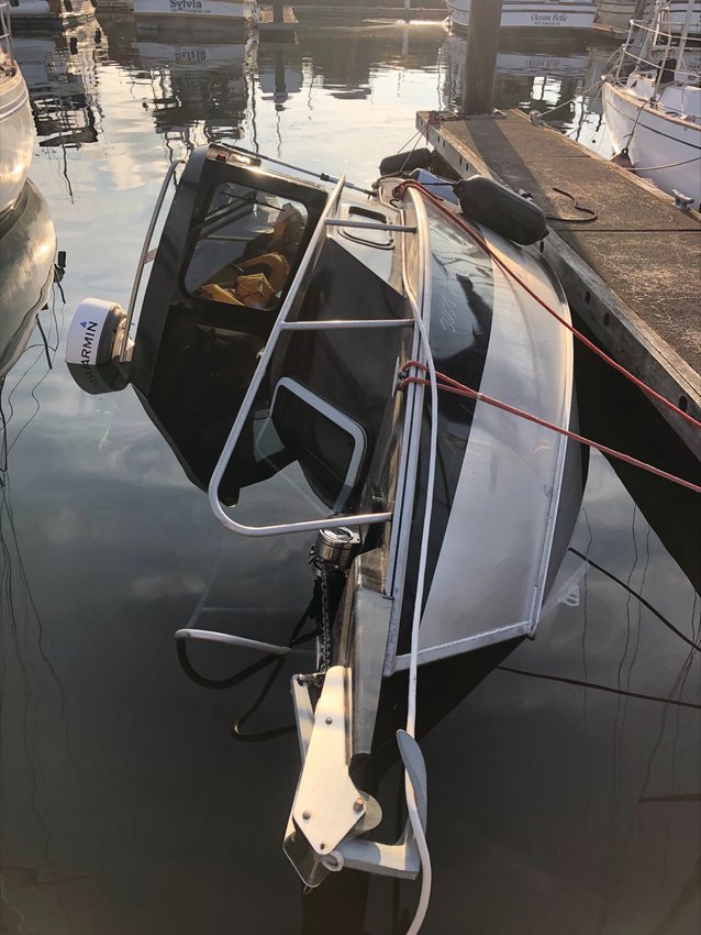 This Hewescraft recreational boat managed to sink while docked at the Boat Haven Marina.