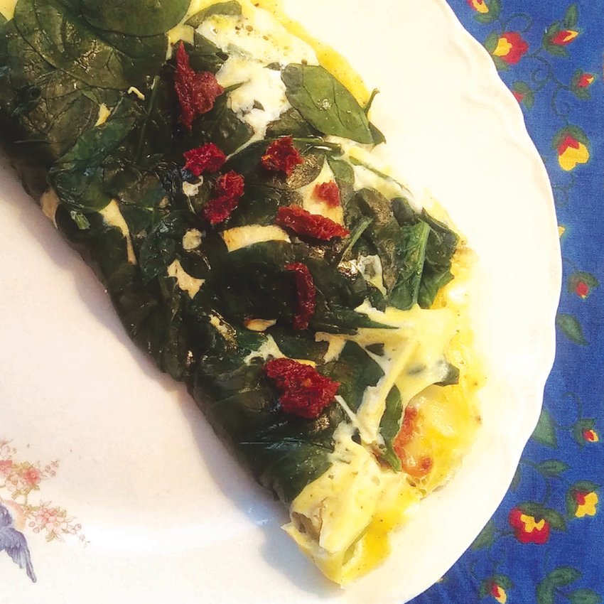 An Italian spinach omelete made with the help of parchment paper.
