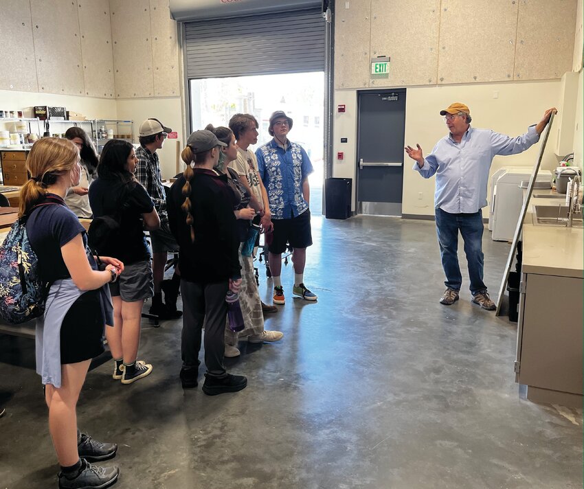 Port Townsend High media students listen to resources creator and director Kevin Considine, who lives part time with his father John Considine (writer and actor) in Cape George.
