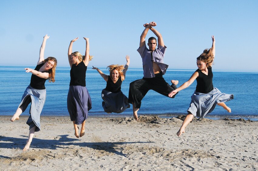 Bill Evans Dance Company members frolic on the beach.