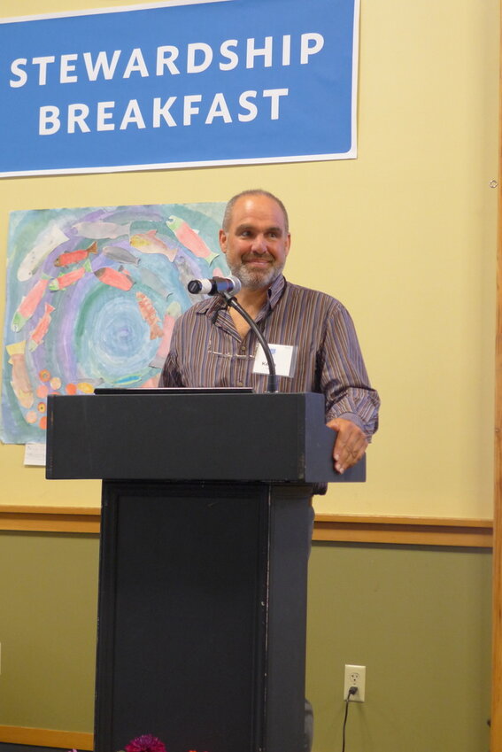 Kevin Long receives the Environmental Leadership Award from PT Marine Science Center.&nbsp;