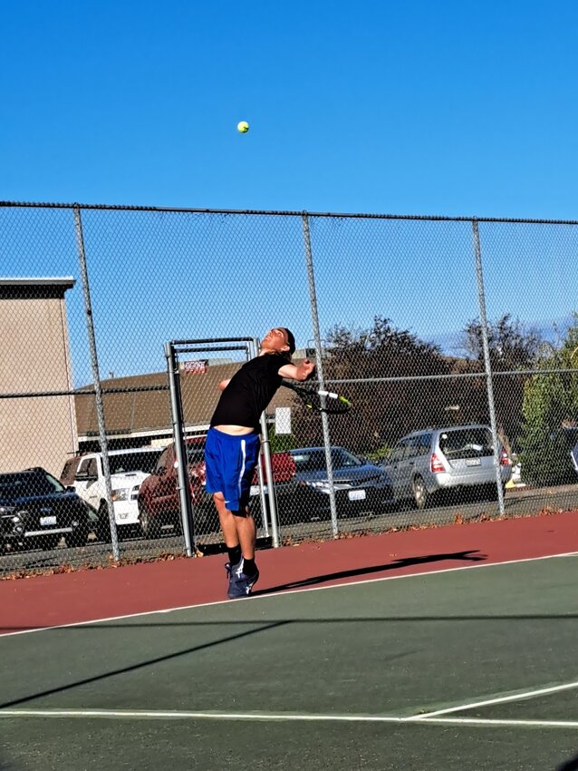 East Jefferson&rsquo;s #1 singles player Reid Martin returns a volley against Vashon on September 19th.