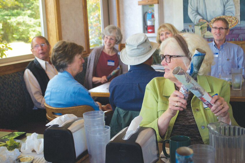 Eleanor Lee sings along with the group gathered at Ferino&rsquo;s Pizza on June 27, 2019 for the one-year anniversary of the Memory Cafe. Leader file photo