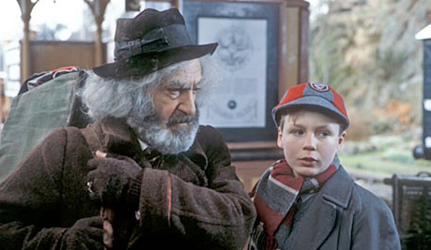 When wandering puppeteer Cole Hawlings (Patrick Troughton) warns that &ldquo;the wolves are running,&rdquo; traveling schoolboy Kay Harker (Devin Stanfield) takes heed, in &ldquo;The Box of Delights&rdquo; by the BBC. Courtesy photo