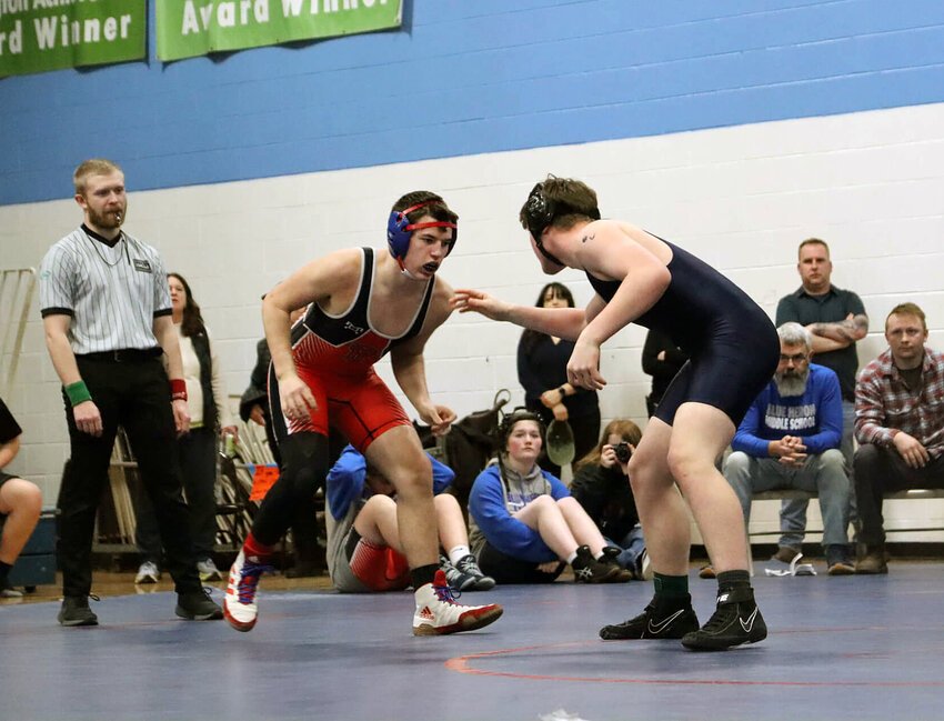 Chimacum 8th Grader Aiden Glenn has his Port Angeles opponent Riley Arnold locked up tight in a cradle. Glenn gained valuable experience this winter as a manager with the wrestling team, and is currently undefeated this middle school season with a record of 5-0. Photo by Grace Liskee