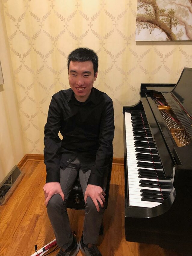 Blind piano teacher Tony Lu is visiting Port Townsend from Vermont.