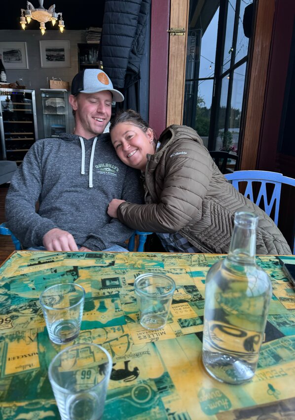 Jay and Michaela Kothman enjoy a quiet moment at their newly acquired Ajax Caf&eacute;.