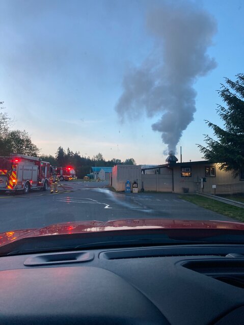 East Jefferson Fire Rescue personnel vent smoke from the Spruce Goose Cafe, at the Jefferson County International Airport, after it experienced &ldquo;a minor grill fire&rdquo; on the morning of Wednesday, May 8.