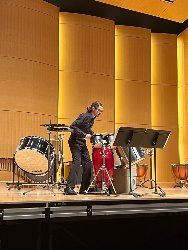 CHS junior Hayden Montgomery performs his multi-percussion solo at Central Washington University.