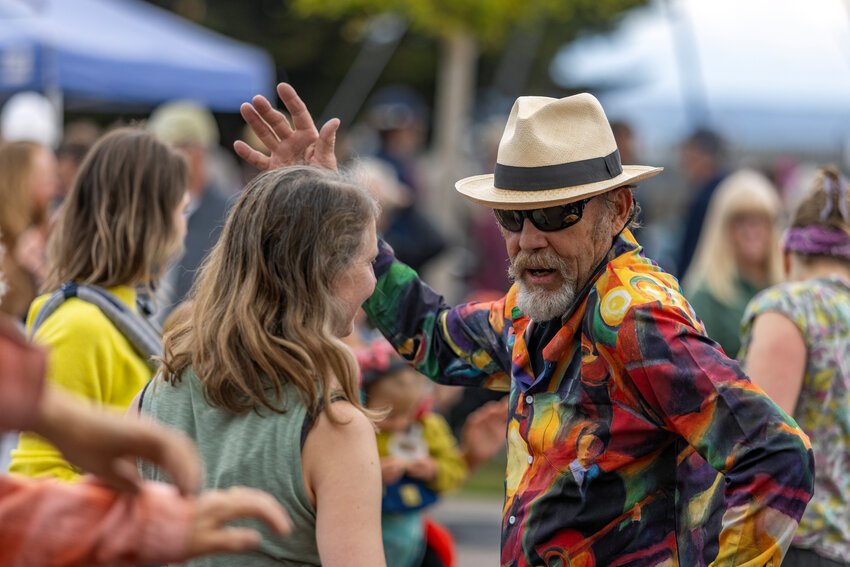 Michael Morrow dances at the Cake Picnic at Pope Marine Park in Port Townsend.