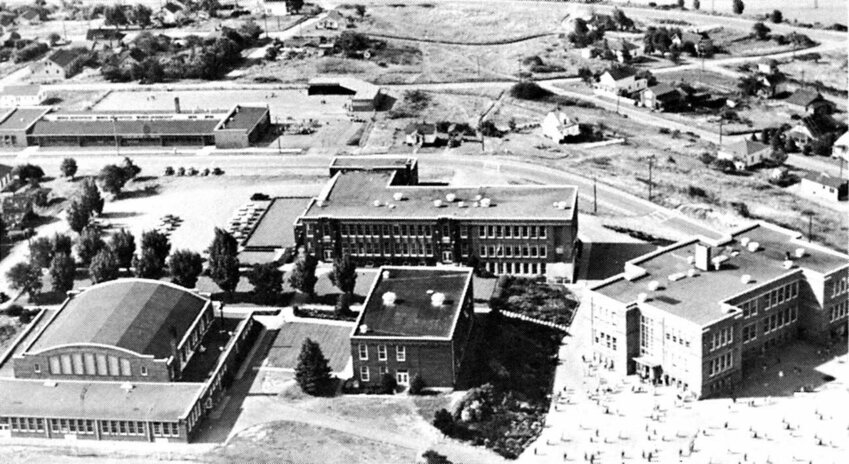 The Lincoln Building (far right) was in full use as a grade 3-6 elementary school when this photo was taken in the 1959-60 school year. What&rsquo;s known as the Gael Stuart Building today (upper left) was being used for all of Port Townsend&rsquo;s kindergartners and some students in grades 1-2. Grant Street Elementary was also a grade 1-6 school, with boundaries used to determine which kids went to which elementary. The Lincoln Building is now listed on the National Register of Historic Places. Photo from Leader collection