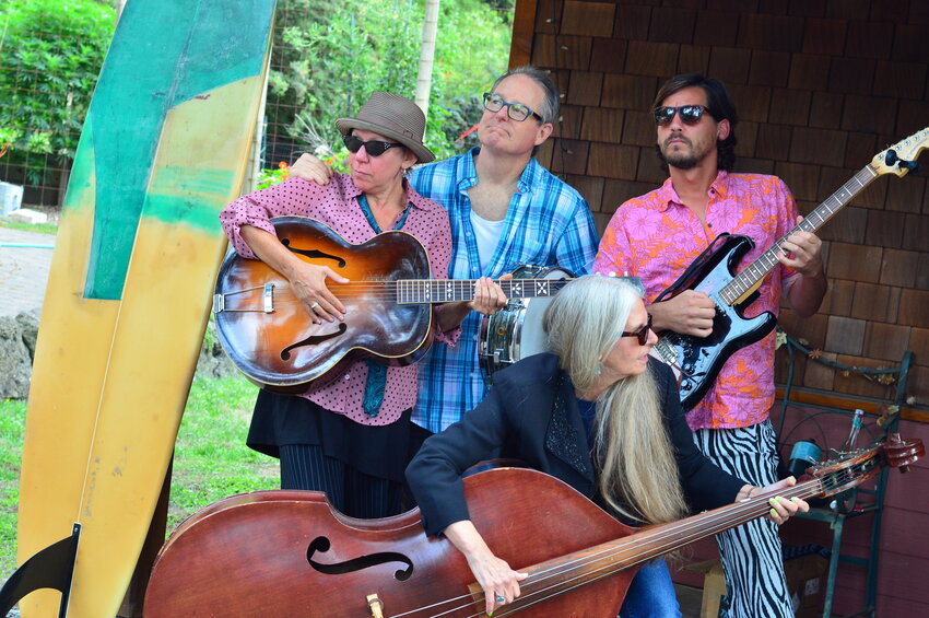 The Salish Surf Rockabillies band are set to play the Oct. 19 Northwind Art Gala at Fort Worden’s USO Hall. From left, the band’s lineup includes singer-guitarist Jessica Logan, drummer Dana Sullivan, upright bassist Tracy Grisman and guitarist-vocalist Chile Dog Quiroz.