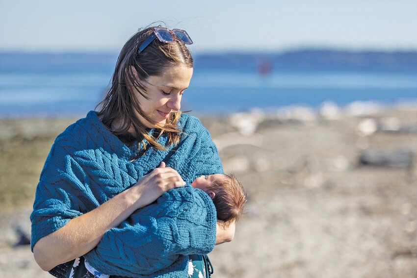 Karen Mullen holds her newborn son, Bruce Arthur Mullen, at Point Hudson.