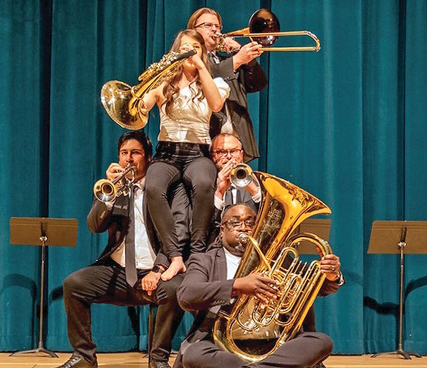 The musicians of Alias Brass Company are John Bahatia on trumpet, Tim Dueppen on trombone, Natalie Higgins on horn, Clay Maddox on tuba, and T.J. Tesh on trumpet.&nbsp;